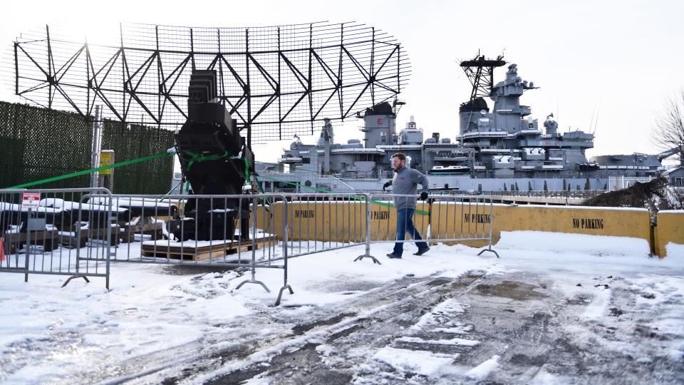 Marshall Spevak, the Interim CEO of the Battleship New Jersey Museum and Memorial, walks near the radar array that was removed from the Battleship New Jersey in preparation of the upcoming trip to dry dock at the Philadelphia shipyard for major maintenance.