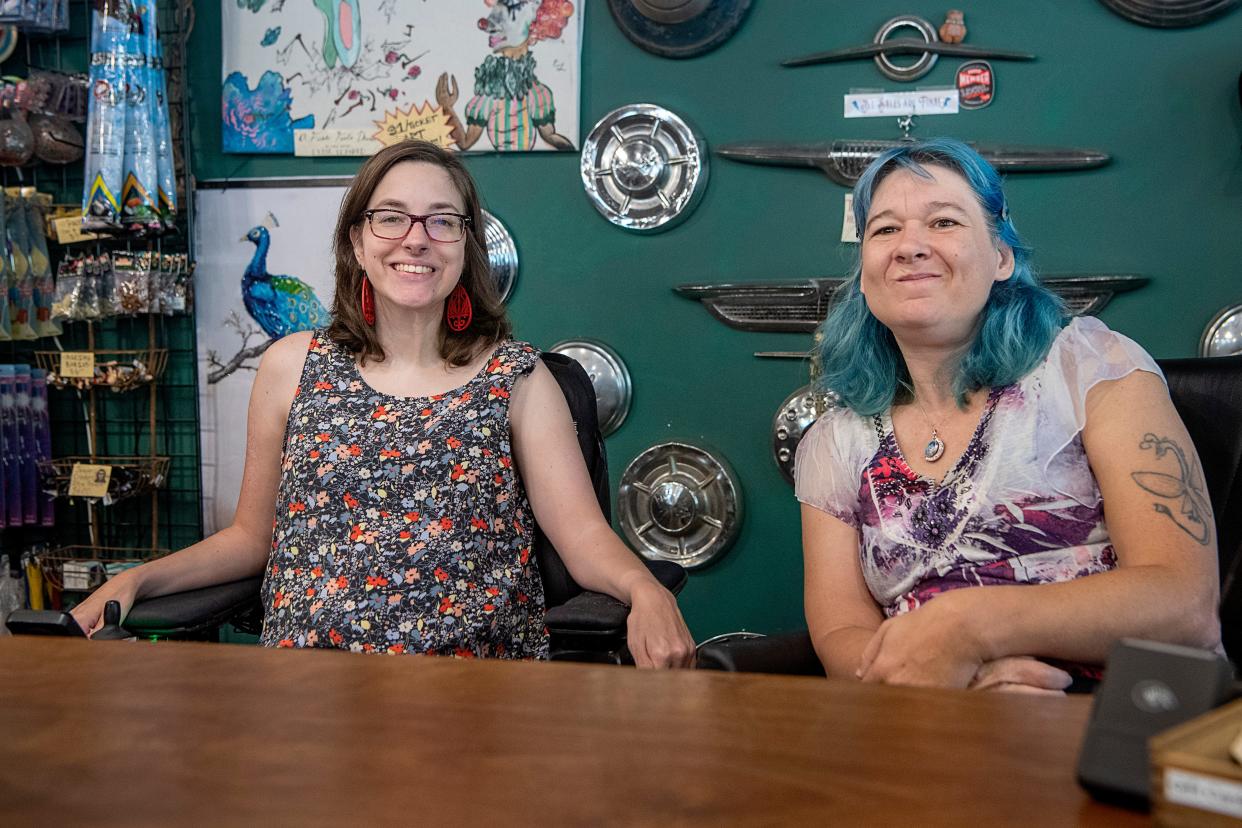 Hayley Michaels, left, and Amanda Levesque at their workplace, Madame Clutterbuckets, August 6, 2023, in Asheville.
