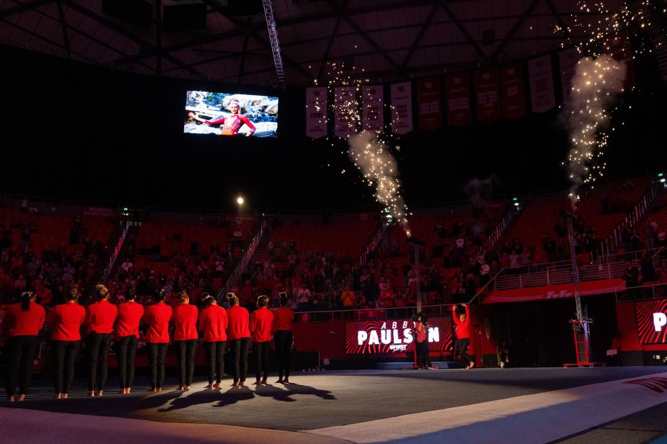 Members of the University of Utah gymnastics team are welcomed to the floor during the Red Rocks Preview at the Jon M. Huntsman Center in Salt Lake City on Friday, Dec. 15, 2023.