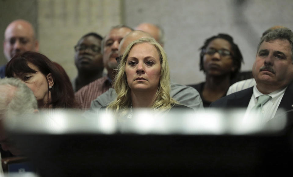 Tiffany Van Dyke, wife of Chicago police Officer Jason Van Dyke listens in court on Tuesday, Oct. 2, 2018, during her husband's first degree murder trial for the shooting death of Laquan McDonald at the Leighton Criminal Court Building in Chicago. (Antonio Perez/ Chicago Tribune via AP, Pool)