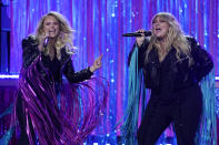 Miranda Lambert, left, and Elle King perform at the 56th annual Academy of Country Music Awards on Saturday, April 17, 2021, at the Grand Ole Opry in Nashville, Tenn. The awards show airs on April 18 with both live and prerecorded segments. (AP Photo/Mark Humphrey)