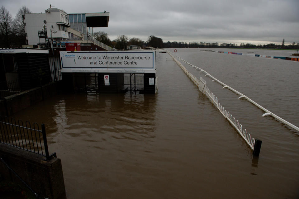 Flood water covers the racecourse at Worcester after heavy rain.