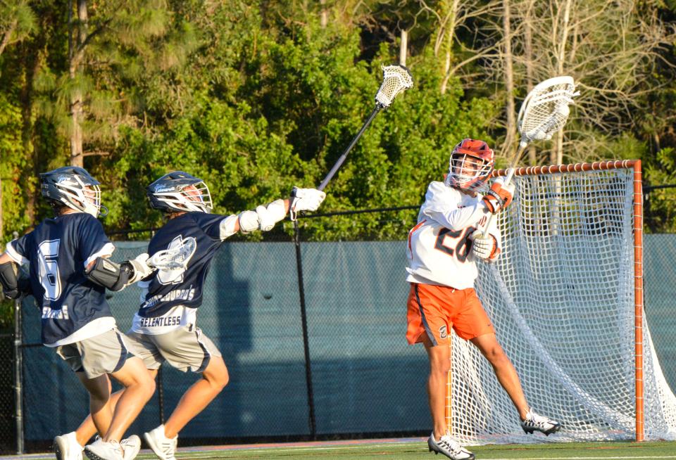 Benjamin's Tatum Little makes a save during a district finals match against St. Edward's on April 17, 2024.