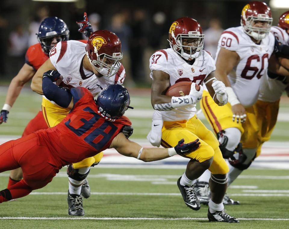 USC running back Javorius Allen (37) carries the ball during a 2014 win over Arizona.