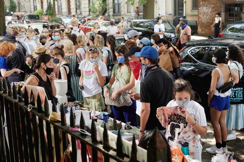 Brooklyn, NY - August 9, 2020Attendees browse the goods for sale at the "Black Lives Matter Sidewalk Sale", a fundraising event that has taken place at on Sundays at McGolrick Park since early June.