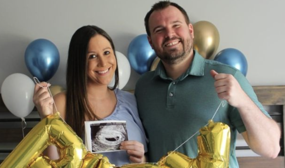 Matthew Evers, 34, and his pregnant wife Ivy at their baby shower.