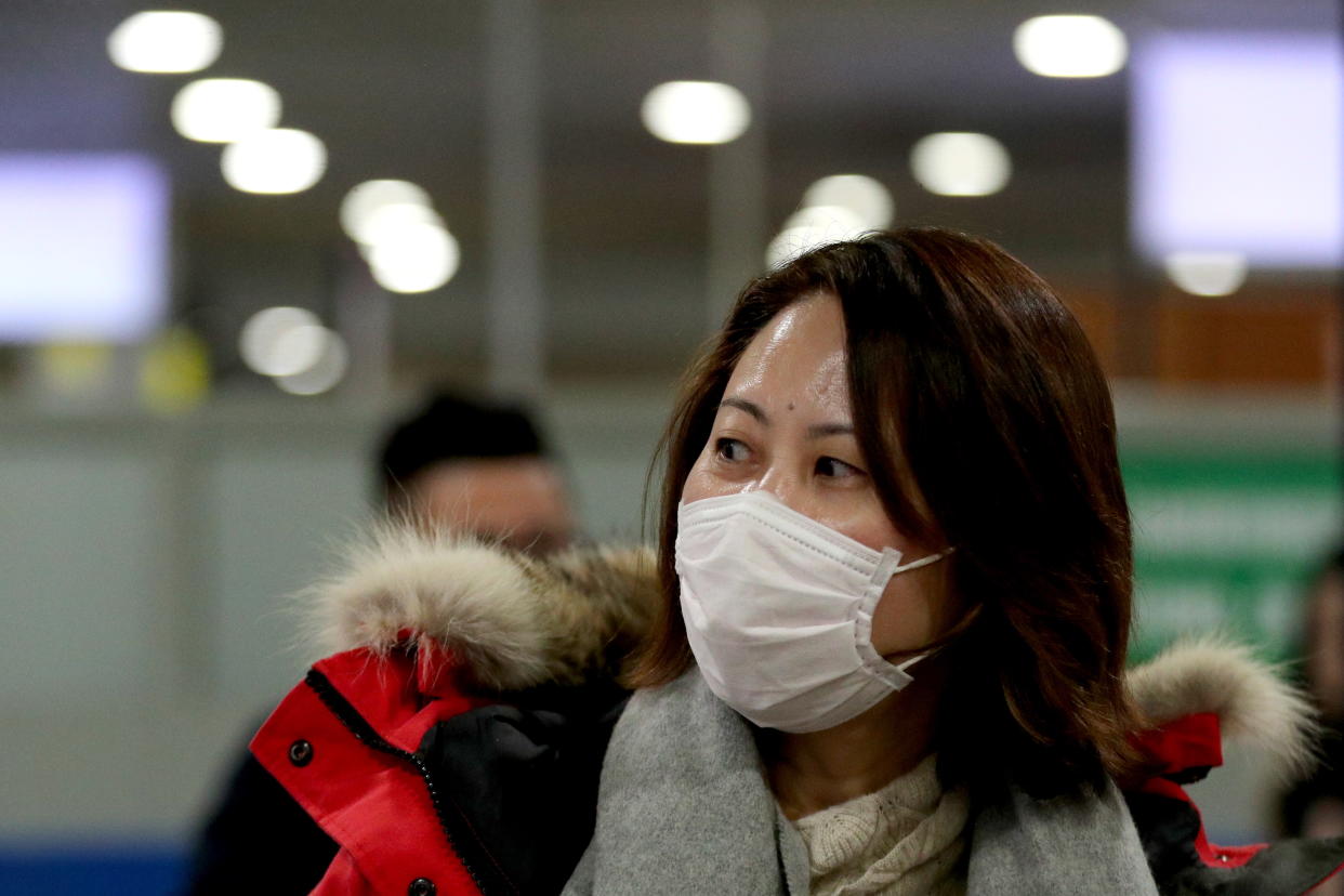 MOSCOW REGION, RUSSIA - JANUARY 22, 2020: A young girl at Sheremetyevo International Airport. Due to an outbreak of a pneumonia-like coronavirus in China, employees of the quarantine control service of Sheremetyevo International Airport remotely measure temperature of Chinese passengers using thermal imaging devices. Mikhail Tereshchenko/TASS (Photo by Mikhail Tereshchenko\TASS via Getty Images)