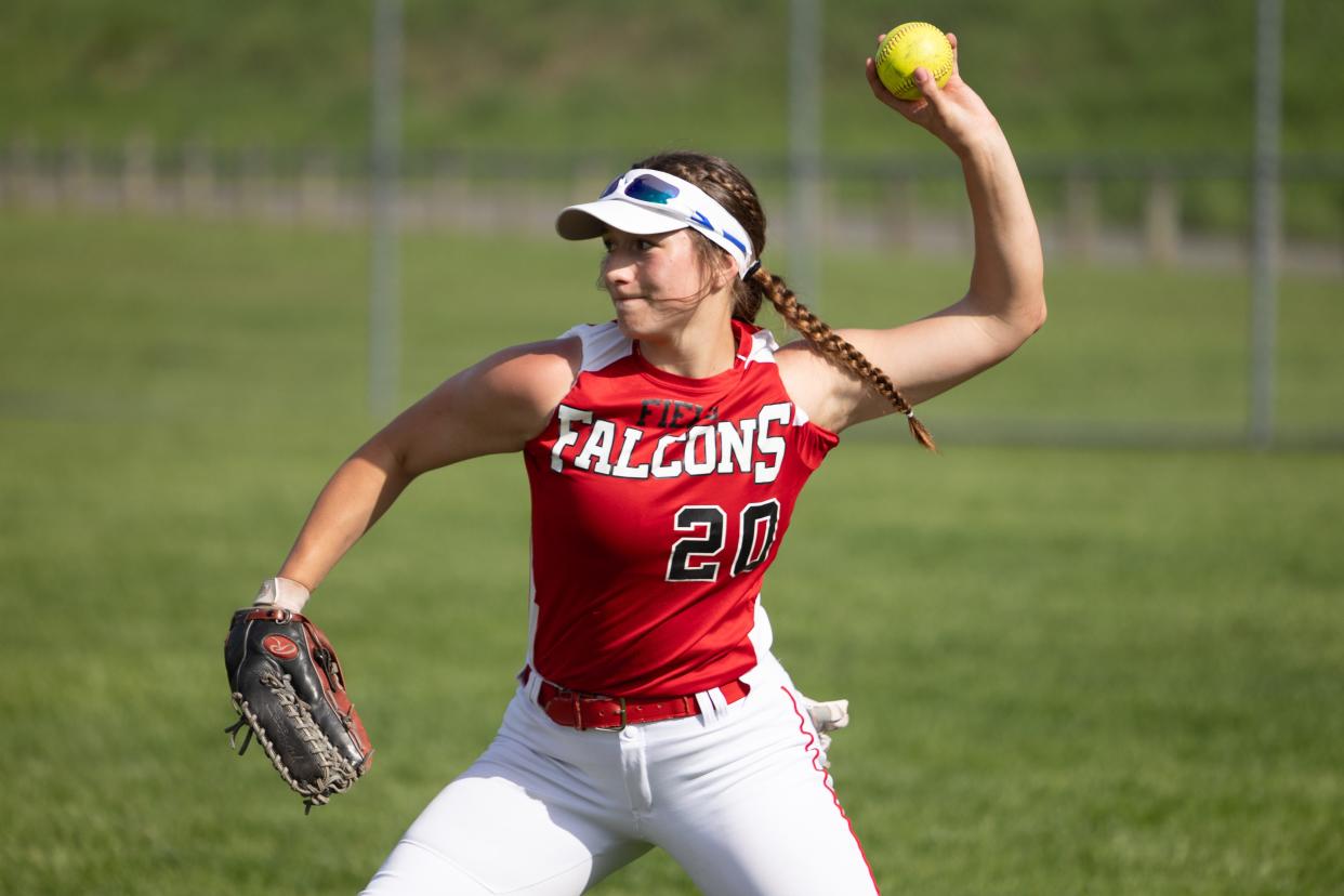 Field right fielder Delilah Rahe makes a throw during a high school softball game against the Coventry Comets Monday, April 29 in Coventry Township.