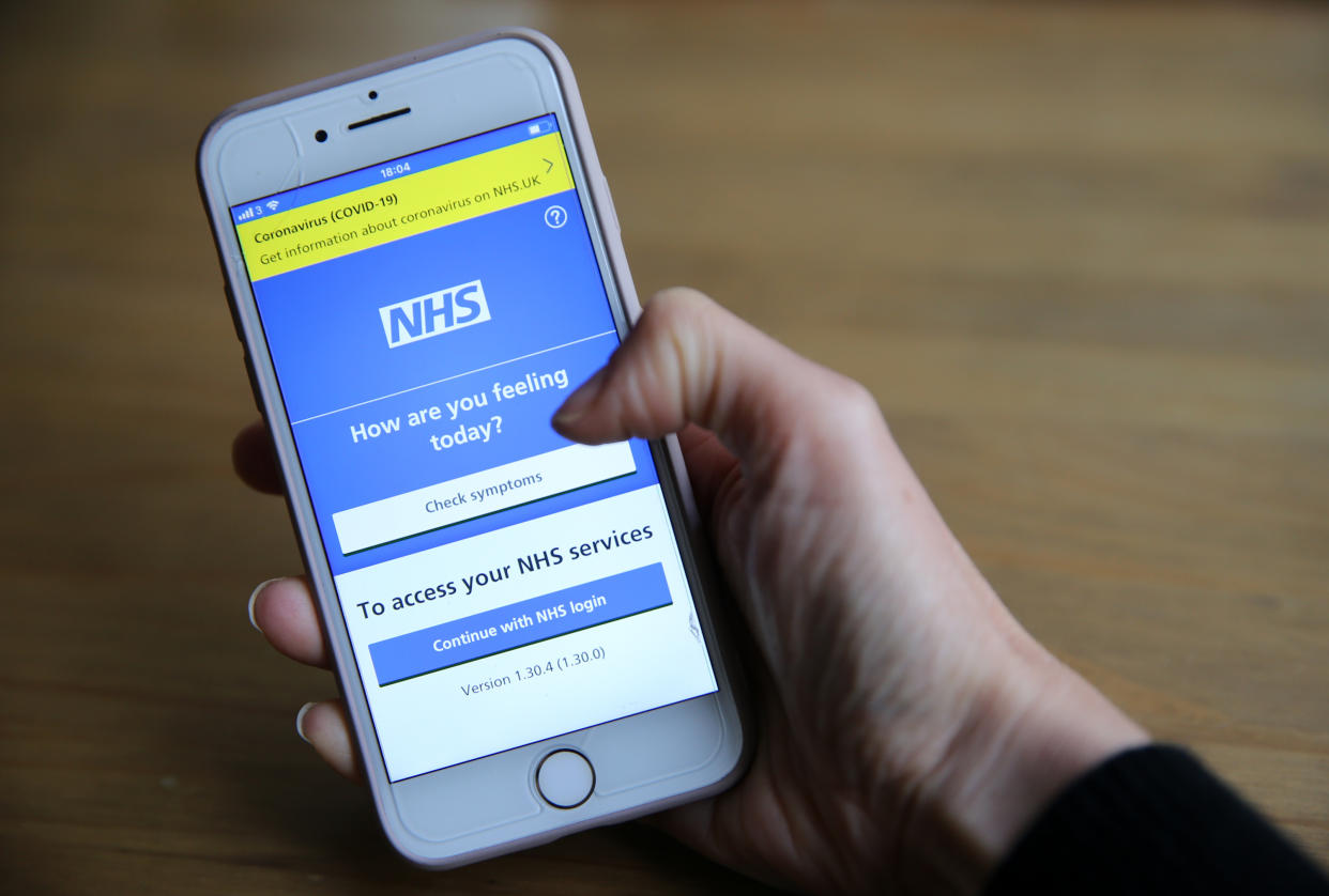 A person using the NHS app on a mobile phone, as the UK continues in lockdown to help curb the spread of the coronavirus. Picture date: Monday April 27, 2020. 