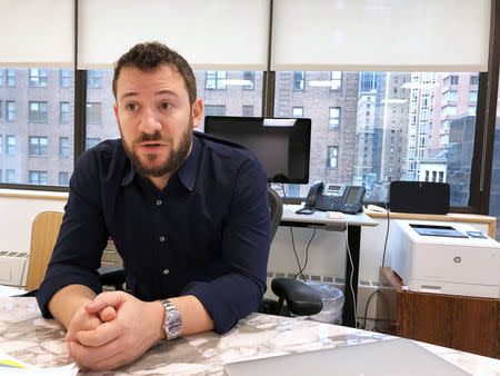 Jonathan Iger, chief executive of the William Kaufman Organization, is interviewed at the firm's office in New York City, U.S. March 13, 2018. Picture taken March 13, 2018. REUTERS/Herbert Lash