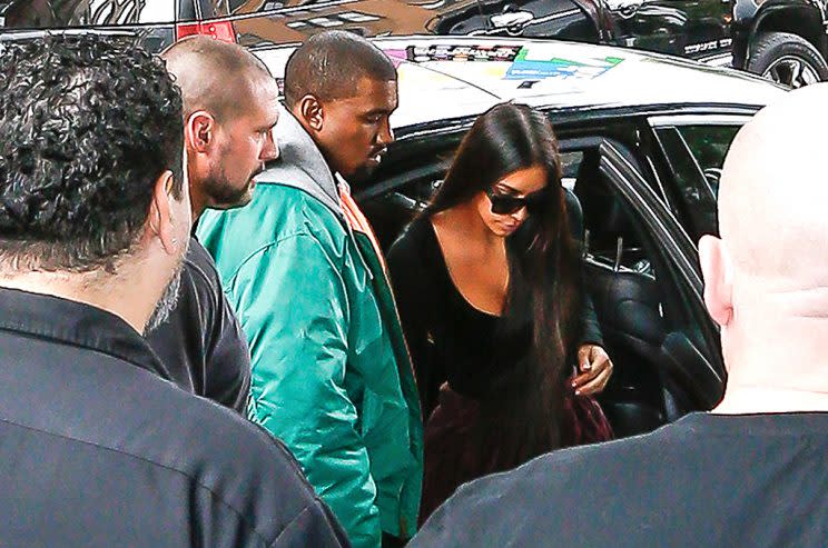 Kanye West stayed by Kim Kardashian's side when she returned to New York after being robbed. (Photo: AKM-GSI)