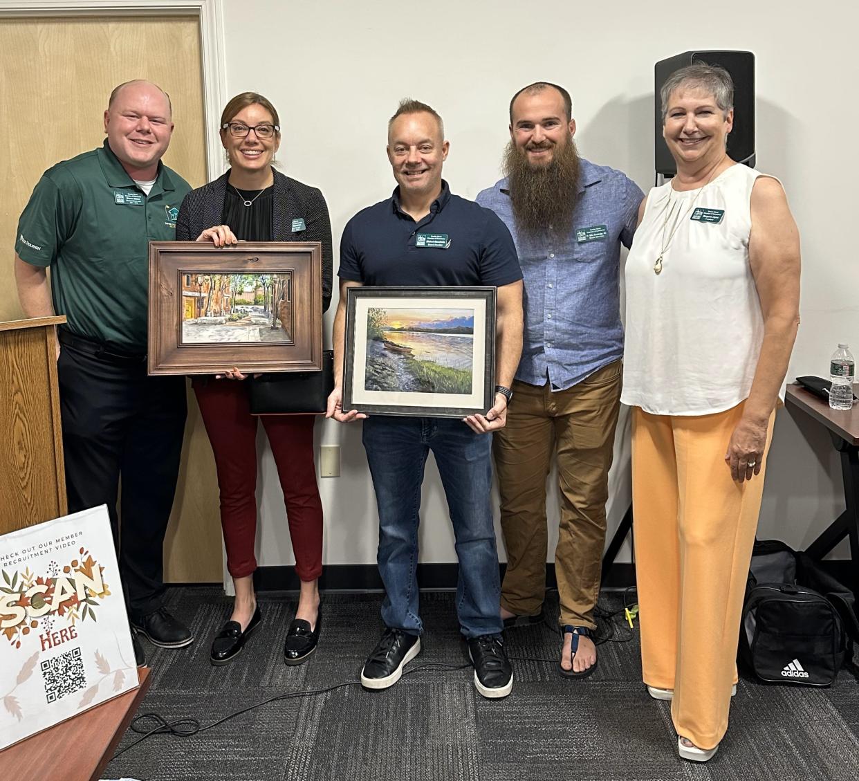 The Greater Dover Chamber of Commerce presented outgoing board members Kelly Glennon of Jewelry Creations and Mike Blanchette of Liberty Mutual Insurance with framed artwork by Dover artists Susan E. Hanna. From left to right are Shawn Olsten, Townsquare Media; Glennon; Blanchette; Dr. Mike Cooledge, Thrive Family Chiropractic; and GDCC President Margaret Joyce.