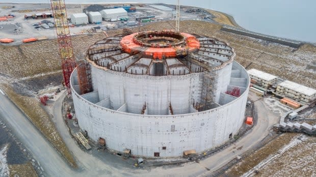 The massive concrete gravity structure for the West White Rose expansion project is more than half complete at a construction site in Argentia, Placentia Bay. The $3.2 billion project was halted last year because of the global pandemic and collapsing oil markets.