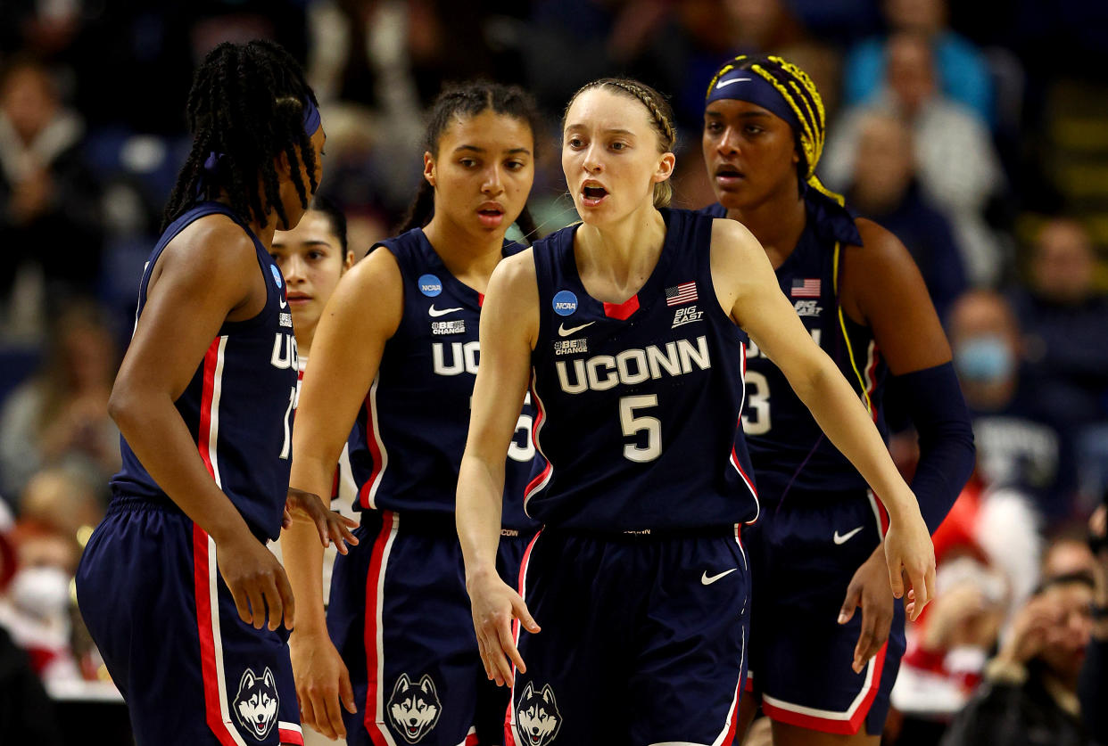 UConn's Paige Bueckers, center, is one of the main reasons why the Huskies are back in the Final Four. (Elsa/Getty Images)
