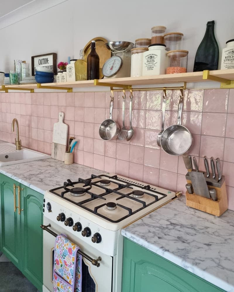 Pink tile backsplash in a remodeled kitchen.