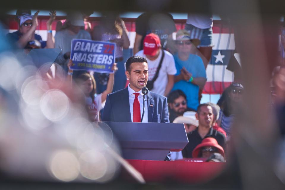 Candidate for Arizona Attorney General Abraham Hamadeh delivers remarks during former President Donald Trump's rally at Legacy Sports Park in Mesa on Oct. 9, 2022.