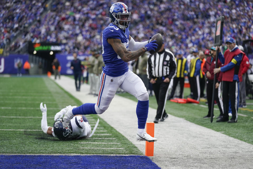 Jones, Barkley lead Giants past Texans 24-16 for 7-2 start