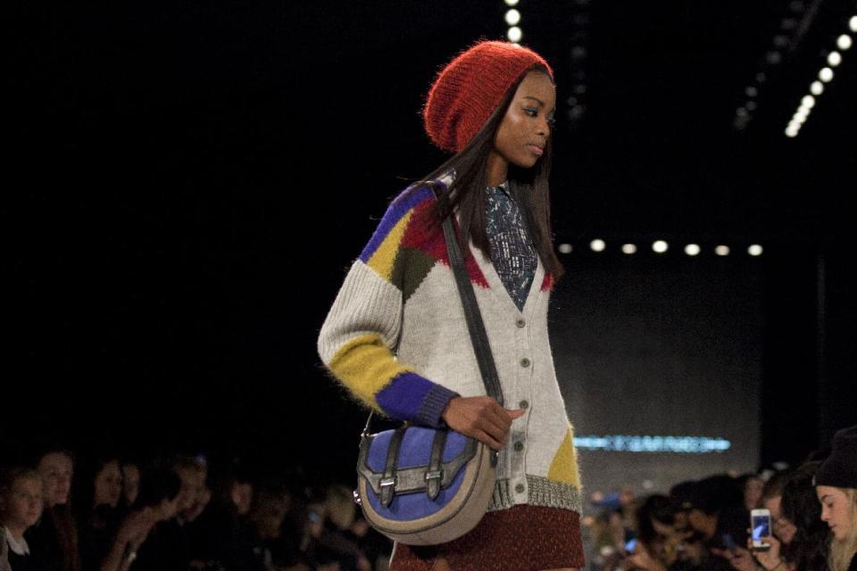 A model walks the runway during the Rebecca Minkoff Fall 2013 fashion show during Fashion Week, Friday, Feb. 8, 2013, in New York. (AP Photo/Karly Domb Sadof)