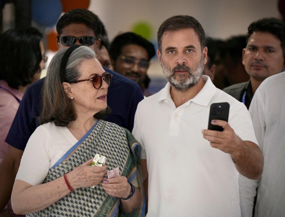 FILE- Congress leader Rahul Gandhi, right, and his mother and senior leader Sonia Gandhi leave a polling booth after casting their vote in the sixth round of polling in India's national election in New Delhi, India, May 25, 2024. India began counting more than 640 million votes Tuesday in the world’s largest democratic exercise, which was widely expected to return Prime Minister Narendra Modi to a third term after a decade in power. (AP Photo/Manish Swarup, File)