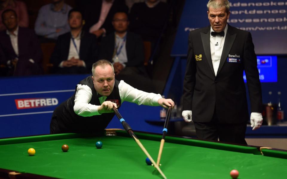 John Higgins - Credit: AFP PHOTO/Paul ELLIS