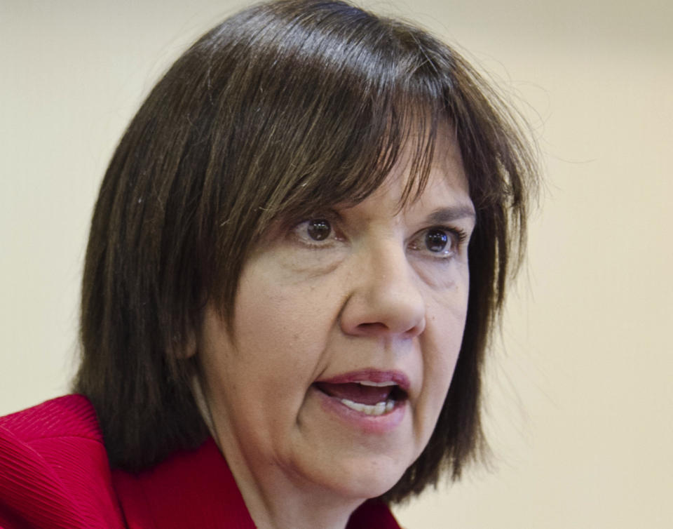 FILE - This Feb. 9, 2011 file photo shows Federal Energy Regulatory Commission (FERC) Acting Chair Cheryl LaFleur speaking in Omaha, Neb. LaFleur, the top federal energy regulator says her agency is taking steps to improve handling of classified national security information, following a report that officials improperly allowed widespread access to a document that outlined specific physical threats to the nation's electric grid. LaFleur told the Senate Energy Committee Thursday that employees are "wiping and scrubbing all databases" among steps to protect sensitive information. (AP Photo/Nati Harnik, File)