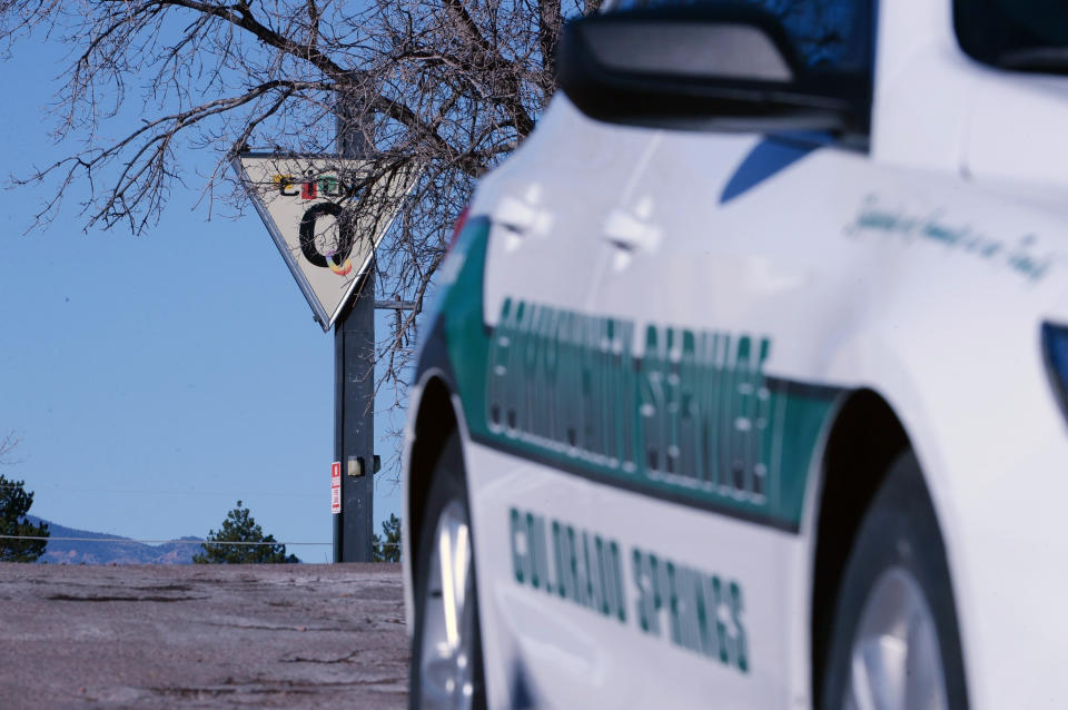 A Colorado Springs Community Service vehicle is parked near a gay nightclub in Colorado Springs, Colo., Sunday, Nov. 20, 2022 where a shooting occurred late Saturday night. (AP Photo/Geneva Heffernan)