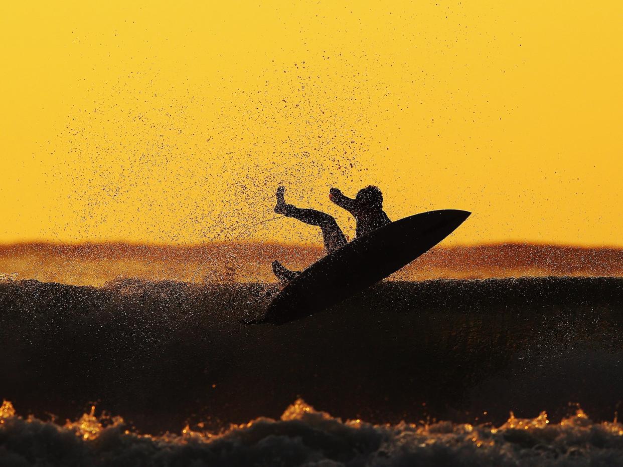 Police say surfers were confronted by two people on the bank, who began shouting abuse at them (file image): Hannah Peters/Getty Images