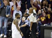 May 23, 2017; Cleveland, OH, USA; Cleveland Cavaliers guard Kyrie Irving (2) reacts after making a three-point basket at the end of the third quarter against the Boston Celtics in game four of the Eastern conference finals of the NBA Playoffs at Quicken Loans Arena. Mandatory Credit: David Richard-USA TODAY Sports