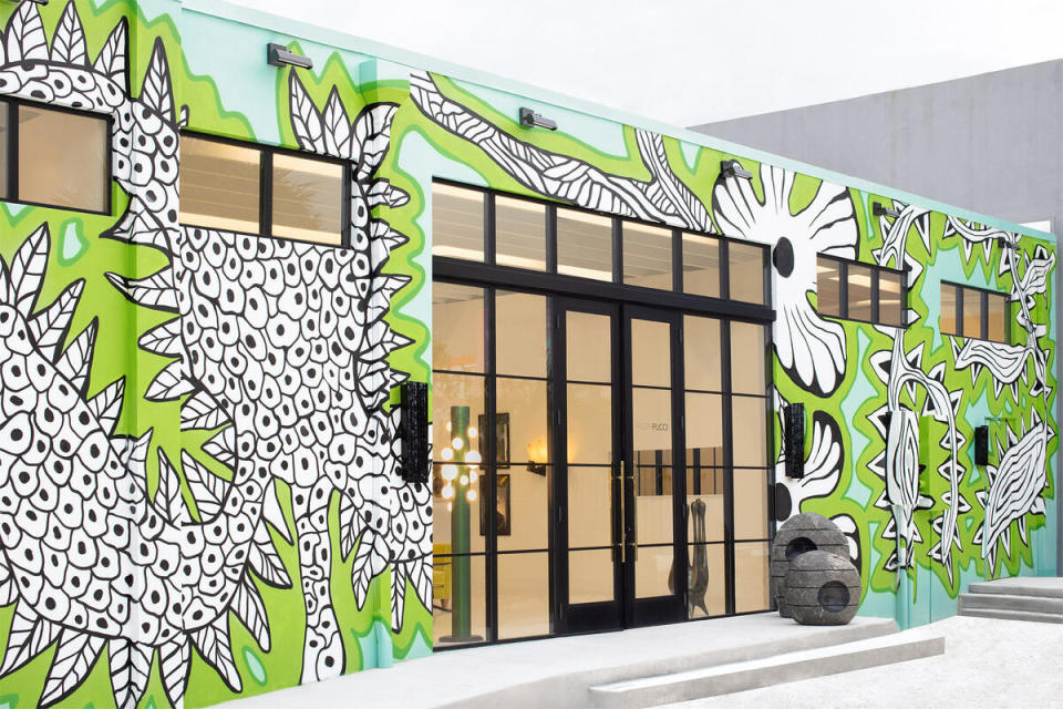 The exterior of the gallery with murals by French designer Elizabeth Garouste