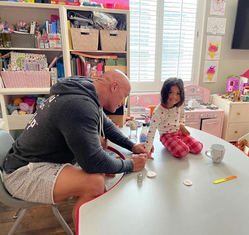 the rock and his daughter