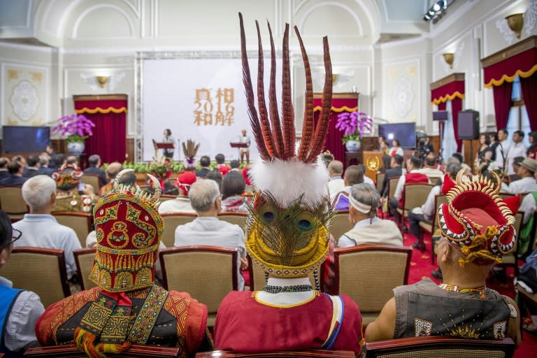 Representatives from some of Taiwan's 16 indigenous tribes attend a ceremony at the presidential office in Taipei on August 1, 2016