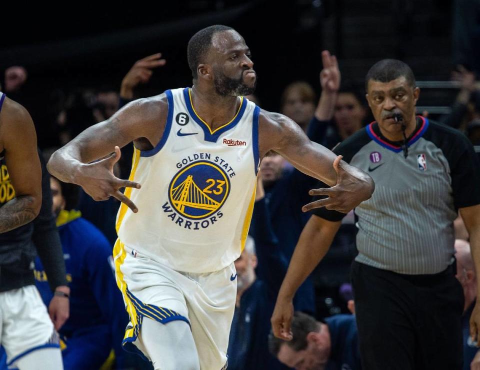 Golden State Warriors forward Draymond Green (23) celebrates a three point basket during Game 5 of the first-round NBA playoff series at Golden 1 Center on Wednesday, April 26, 2023.