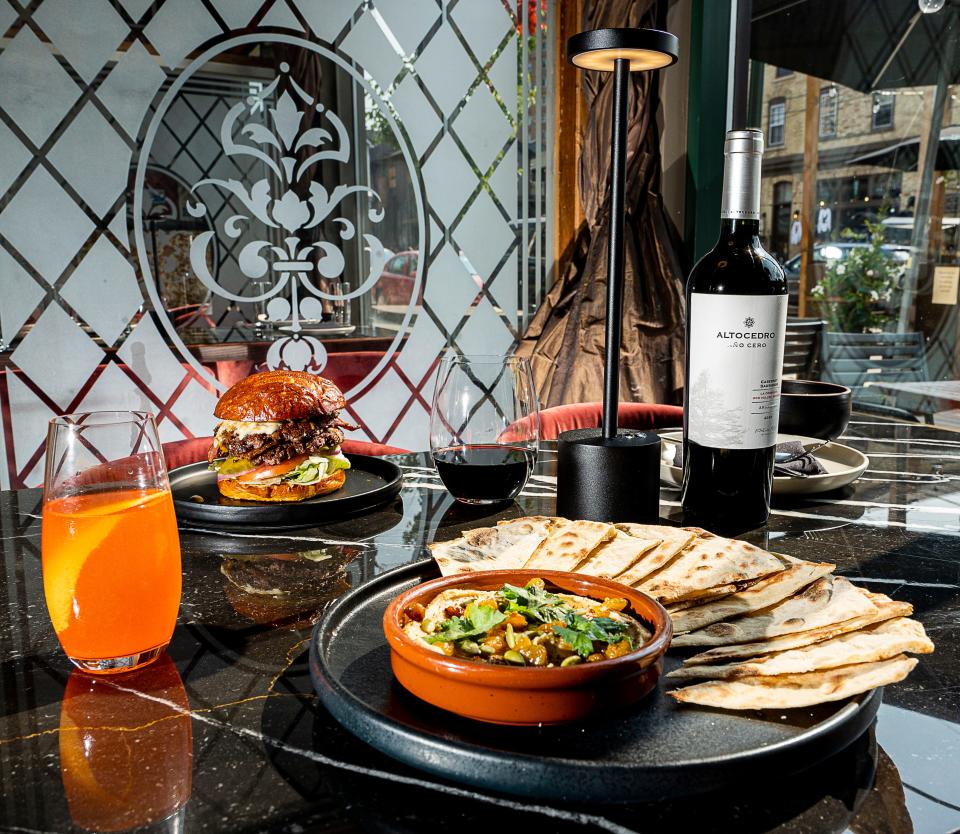 Eggplant pate served with house-made naan bread is an example of Balzac Wine Bar’s rotating menu of hearty appetizers. Ask for a seat at the bar to take advantage of the $20 wine bottle deal during its daily happy hour from 4 to 6 p.m.
