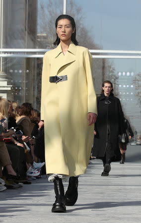 A model presents a creation by Bottega Veneta during the Milan Fashion Week in Milan, Italy February 22, 2019. REUTERS/Alessandro Garofalo