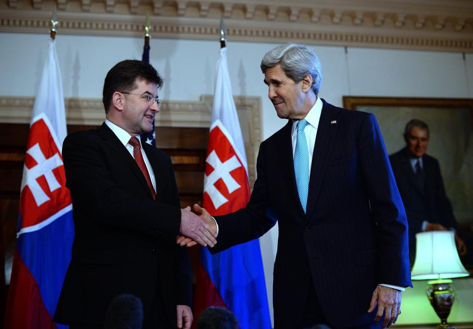 U.S. Secretary of State John Kerry(R) shakes hands with Deputy Prime Minister and Foreign Minister Miroslav Lajcak of Slovakia at the State Department in Washington, DC, on March 20, 2014. (Photo credit should read JEWEL SAMAD/AFP/Getty Images)