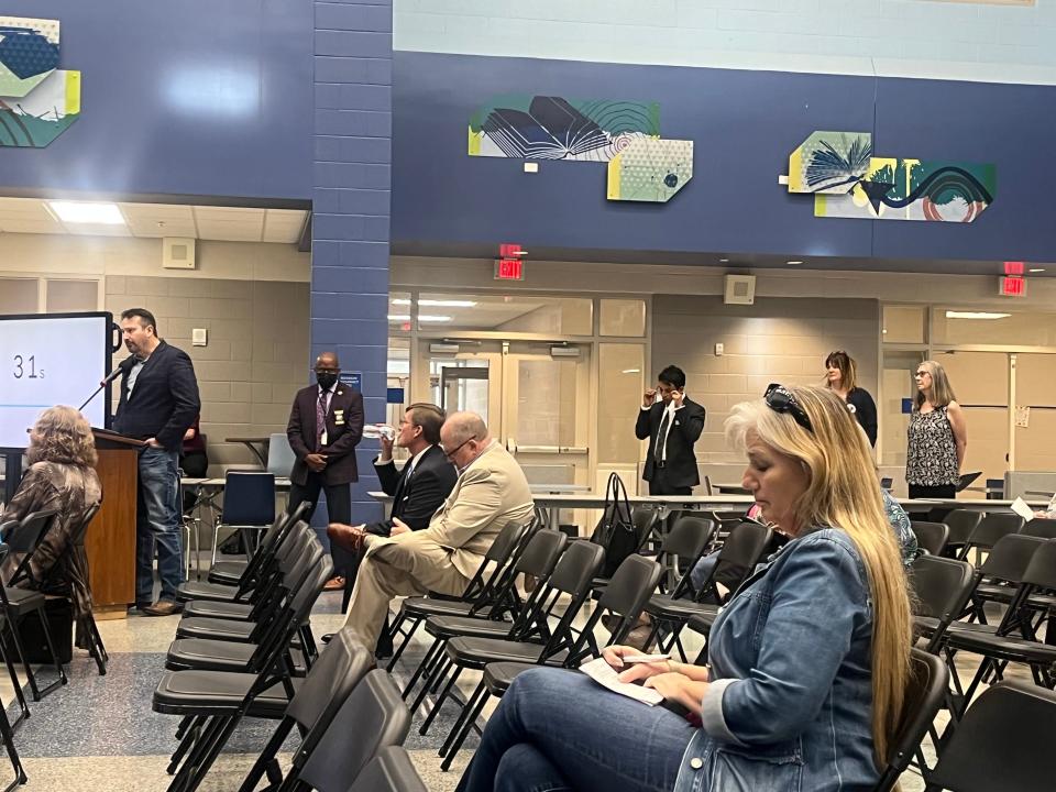 People wait for their turn to speak at a meeting on public education held by a House Select Committee led by Rep. John Torbett, R-Gaston, at Stanley Middle on Monday, April 4.