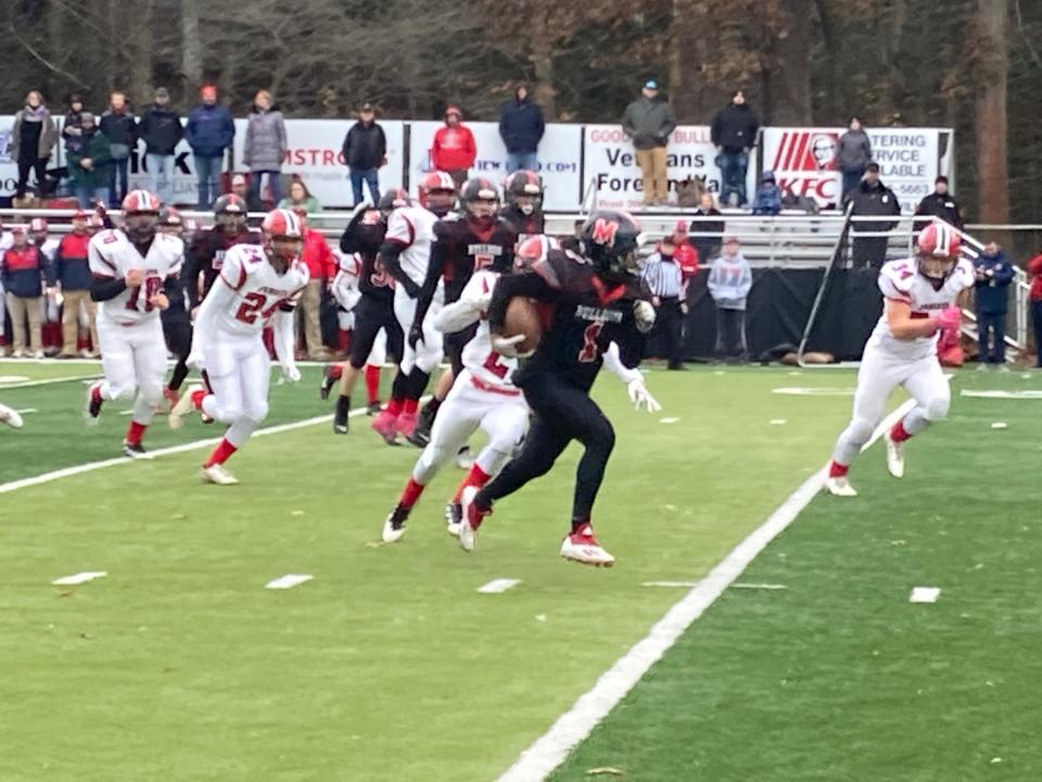 Meadville running back Khalon Simmons tries to elude Juniata's defenders during the Nov. 20, 2021, PIAA Class 4A football playoff at Bender Field.
