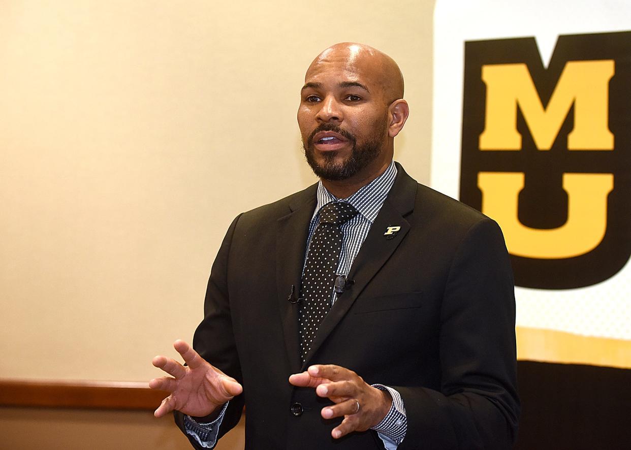 Former Surgeon General Jerome Adams talks to members of the media Monday before conducting a fireside chat on health inequities in the United States inside Stotler Lounge at the University of Missouri.