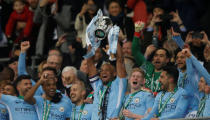 Soccer Football - Carabao Cup Final - Arsenal vs Manchester City - Wembley Stadium, London, Britain - February 25, 2018 Manchester City’s Vincent Kompany lifts the trophy as they celebrate winning the Carabao Cup Action Images via Reuters/Carl Recine