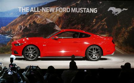 Ford Motor Co. unveils its all new 2015 Ford Mustang in Dearborn, Michigan December 5, 2013. REUTERS/Rebecca Cook