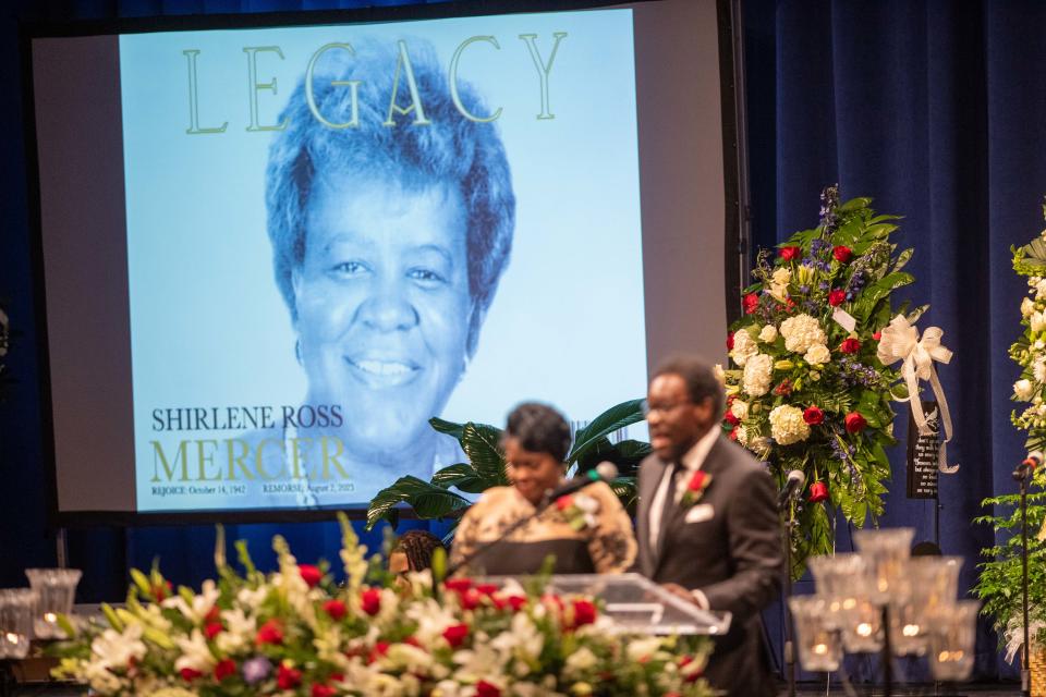 Shirlene Mercer's portrait is on display as Luther Mercer Jr. tells a story about his mother during Shirlene Mercer's funeral service inside Carl Perkins Civic Center on Wednesday, Aug. 9, 2023.