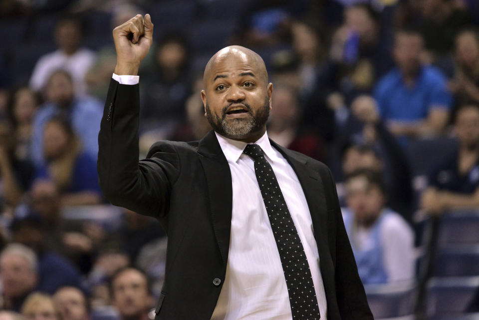 FILE - In this March 23, 2019, file photo, Memphis Grizzlies head coach J.B. Bickerstaff calls to players in the first half of an NBA basketball game against the Minnesota Timberwolves, in Memphis, Tenn. The Cavaliers have added former Grizzlies coach J.B. Bickerstaff to John Beilein’s staff as an associate head coach. Bickerstaff was a candidate for Cleveland’s opening and interviewed for the job before the Cavs lured Beilein away from Michigan after a successful 12-year run. Bickerstaff was fired in April by Memphis following a disappointing 33-49 season. Bickerstaff’s father, Bernie, is a senior adviser with the Cavs. (AP Photo/Brandon Dill, File)