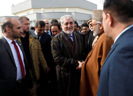 Afghanistan's Chief Executive Abdullah Abdullah leaves after registering as a candidate for the upcoming presidential election at the Afghanistan's Independent Election Commission (IEC) in Kabul, Afghanistan January 20, 2019.REUTERS/Omar Sobhani