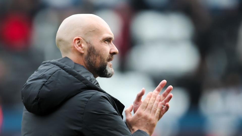 Swansea head coach Luke Williams applauds fans