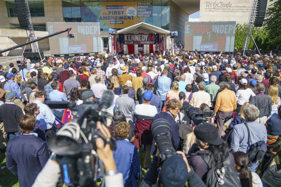 A small crowd faces the stage as presidential candidate Robert F. Kennedy Jr. makes a campaign announcement at a press conference on October 9, 2023, in Philadelphia.