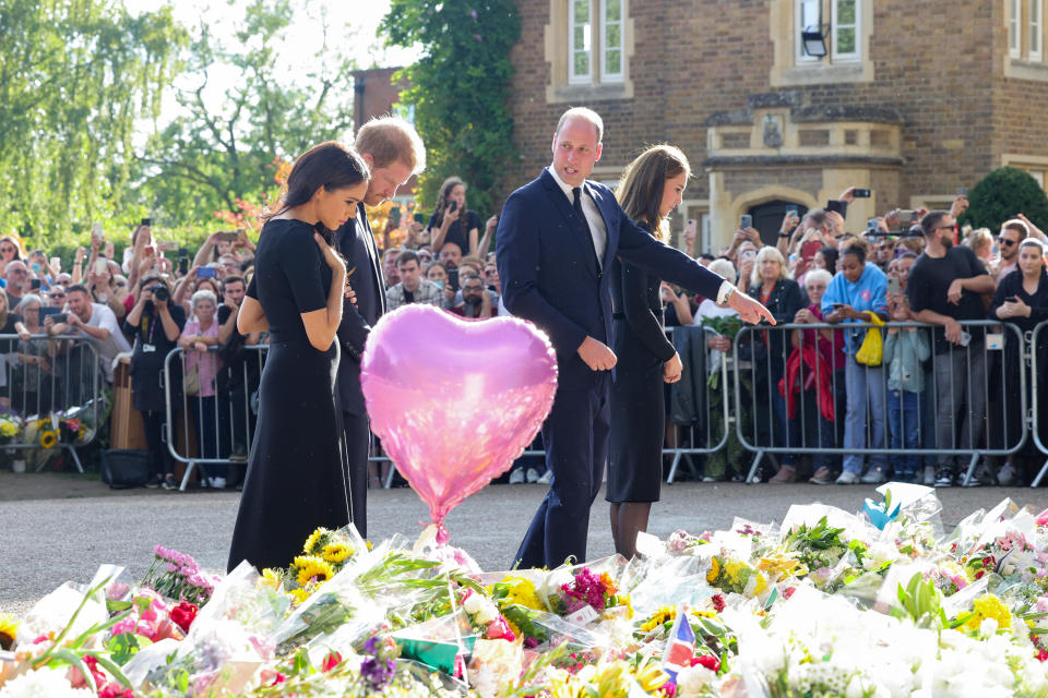 The Prince and Princess of Wales and the Duke and Duchess of Sussex viewing the messages and floral tributes left by members of the public at Windsor Castle in Berkshire following the death of Queen Elizabeth II on Thursday. Picture date: Saturday September 10, 2022.