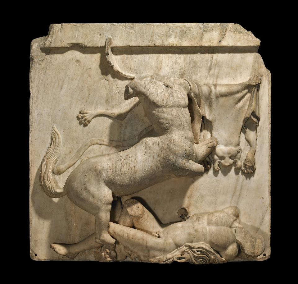 A metope sculpture from the Parthenon showing a mythical battle between a Centaur and a Lapith (The Trustees of the British Museum/PA)