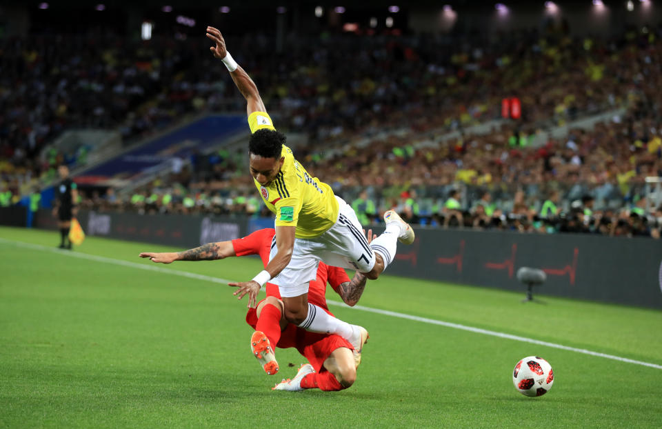 <p>England’s Kieran Trippier (left) and Colombia’s Johan Mojica battle for the ball during the FIFA World Cup 2018, round of 16 match at the Spartak Stadium, Moscow. (Photo by Adam Davy/PA Images via Getty Images) </p>