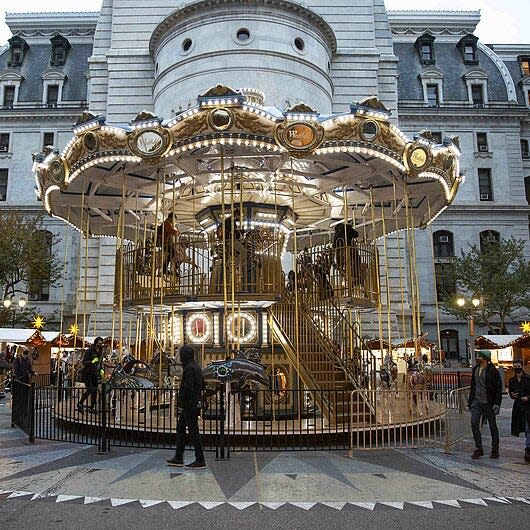 The Christmas Village carousel, on the skirts of Philadelphia City Hal. The carousel is one of the main attraction of the Christamas Village in Philadelphia holiday festival.