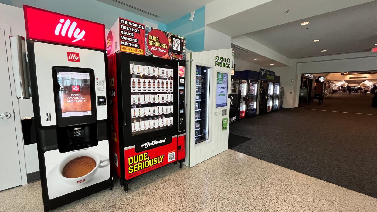 The new Dude, Seriously brand hot sauce vending machine is located in Concourse A.